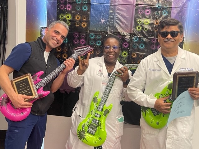 Faculty of the Year, Inpatient Service, winner Dr. Simon Karam poses with Chief of the Division of Neonatology and Newborn Medicine Dr. Mobolaji Famuyide and Leblanc Award Winner Dr. Abhay Bhatt